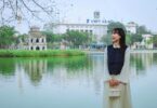 Beautiful Hoan Kiem Lake with a girl