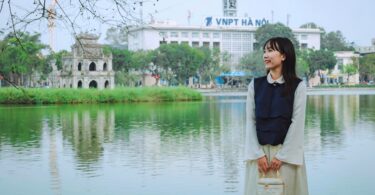 Beautiful Hoan Kiem Lake with a girl