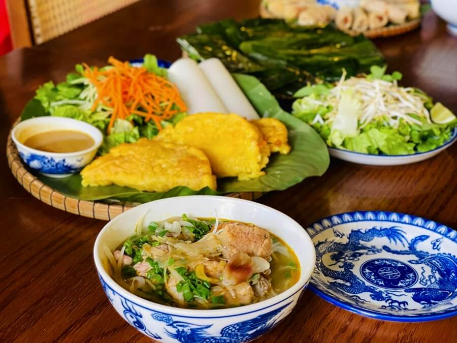 Yellow Banh Khoai and flavorful Bun Bo Hue at Madam Thu Restaurant