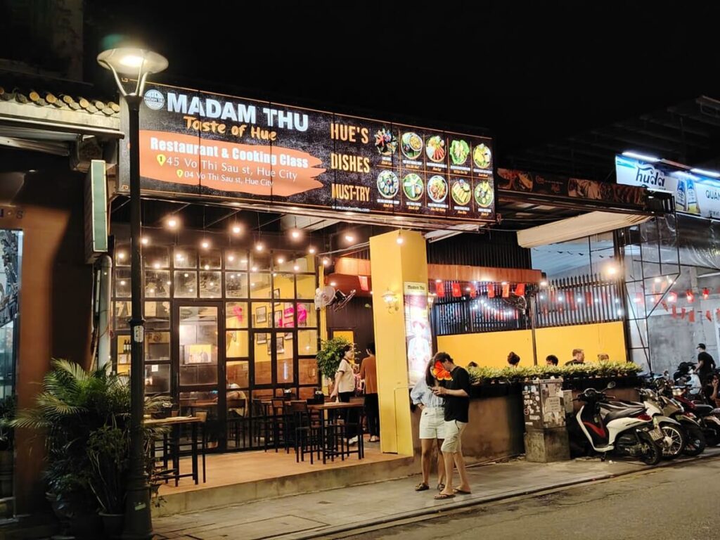 Front face of Madam Thu Restaurant in Hue City, at night
