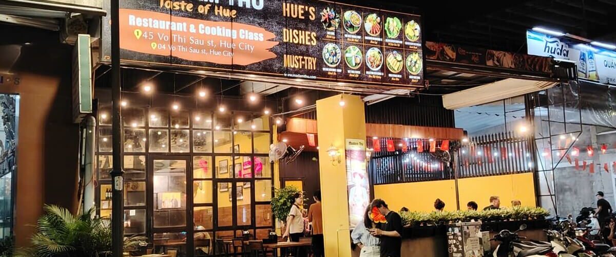 Front face of Madam Thu Restaurant in Hue City, at night