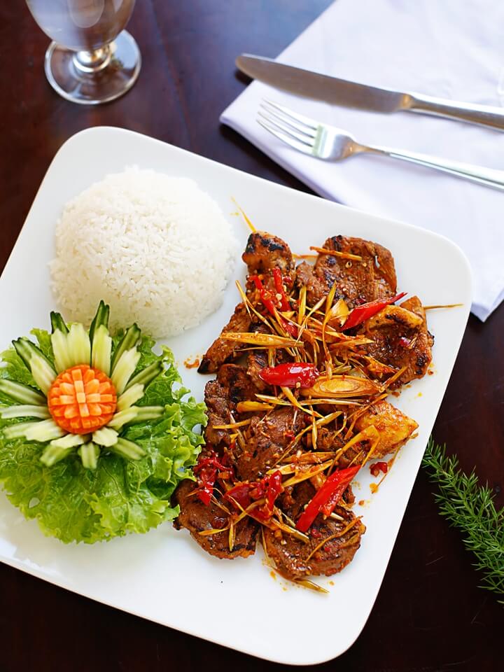Lemongrass braised pork ribs served with rice and vegetables