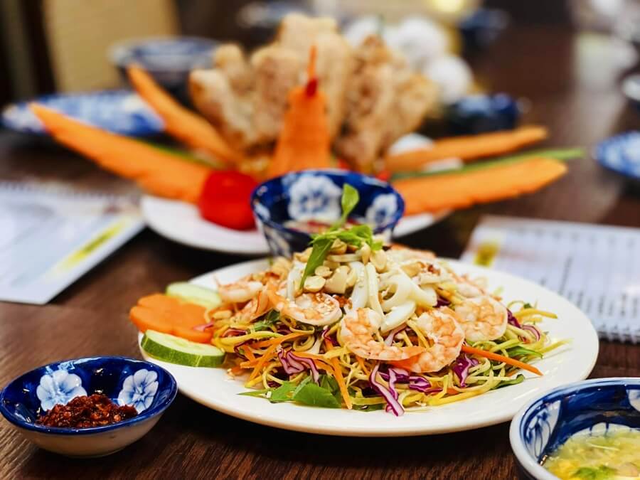Shrimp salad at Madam Thu Restaurant featuring fresh ingredients and vibrant flavors