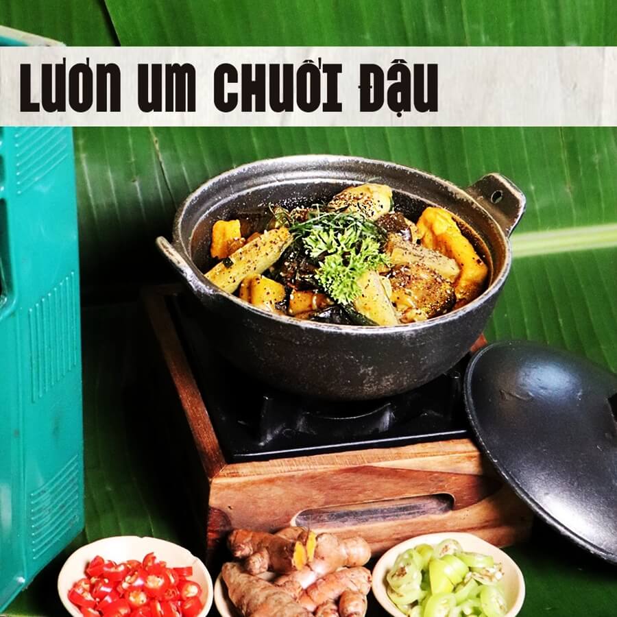 Traditional Vietnamese Eel Stew with Green Banana and Tofu (Lươn Um Chuối Đậu) served hot in a clay pot at DMZ Bar Restaurant Hue