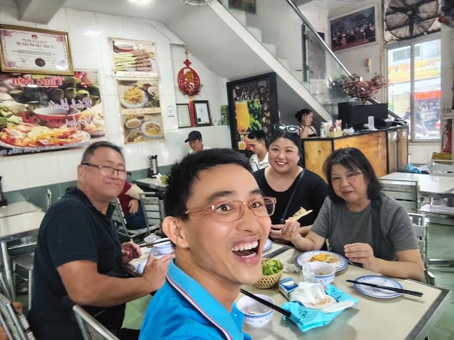 Tourists start tasting local food when doing a food tour in Hue City