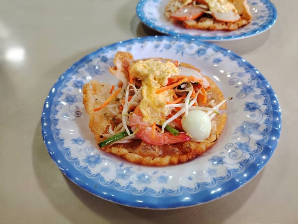 Banh khoai hue yellow pancake with shrimp and egg
