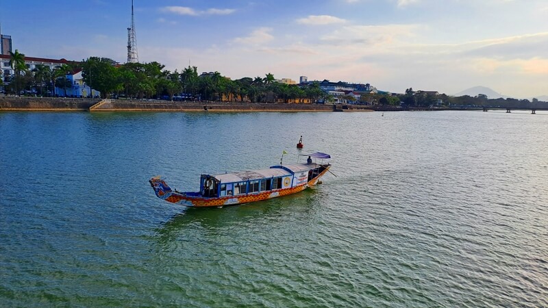 Perfume river water with a dragon boat